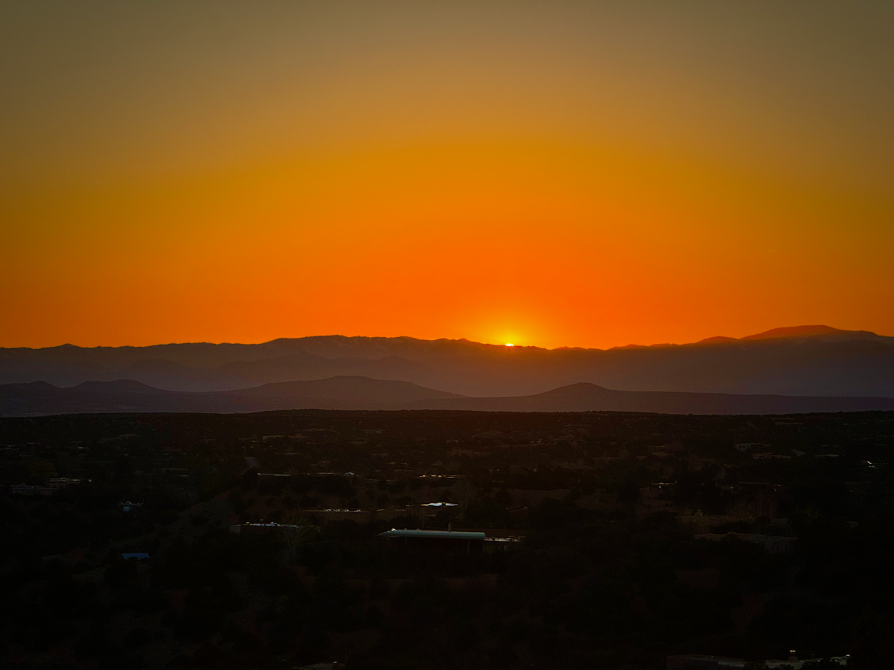 Sunset from hills above Santa Fe.