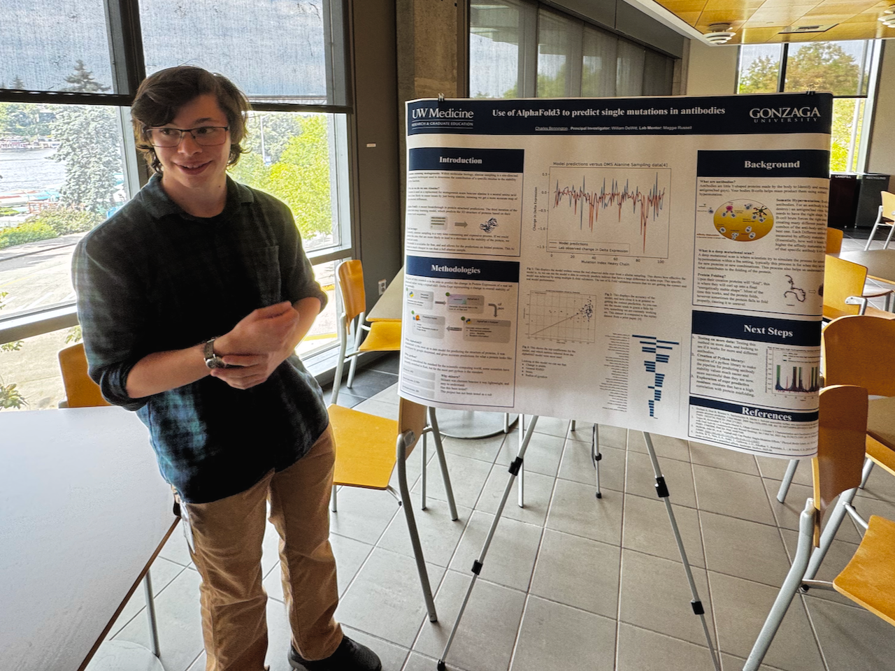 Charles presenting his poster. Go Charles!